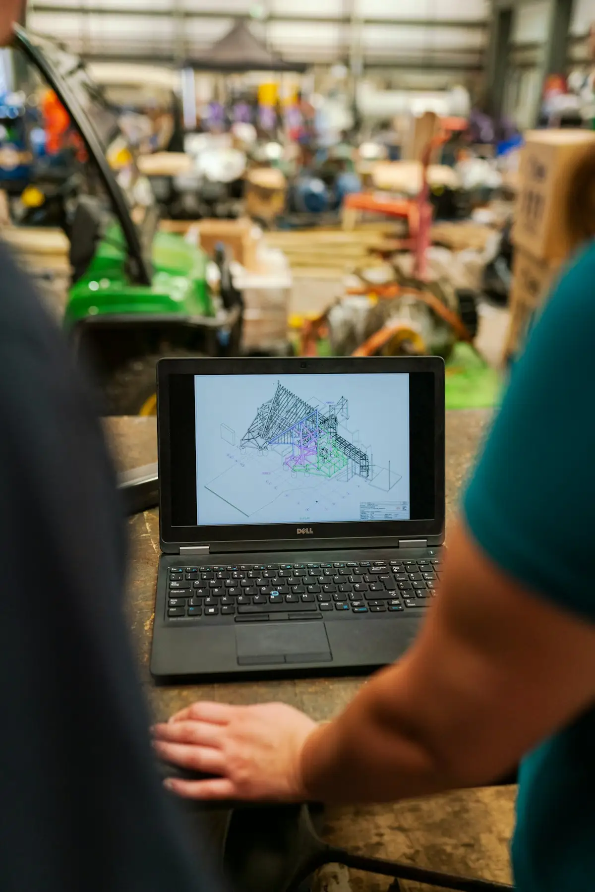Someone working through a process on a laptop