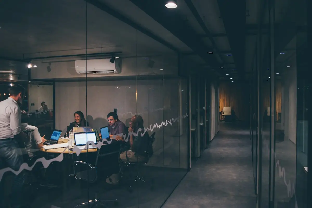 A team meeting in progress around a table