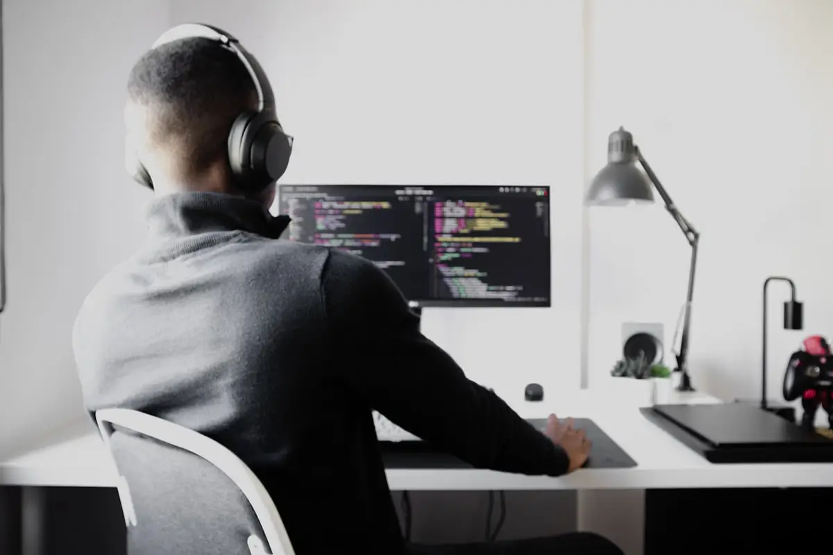 An engineer monitoring a system on screen